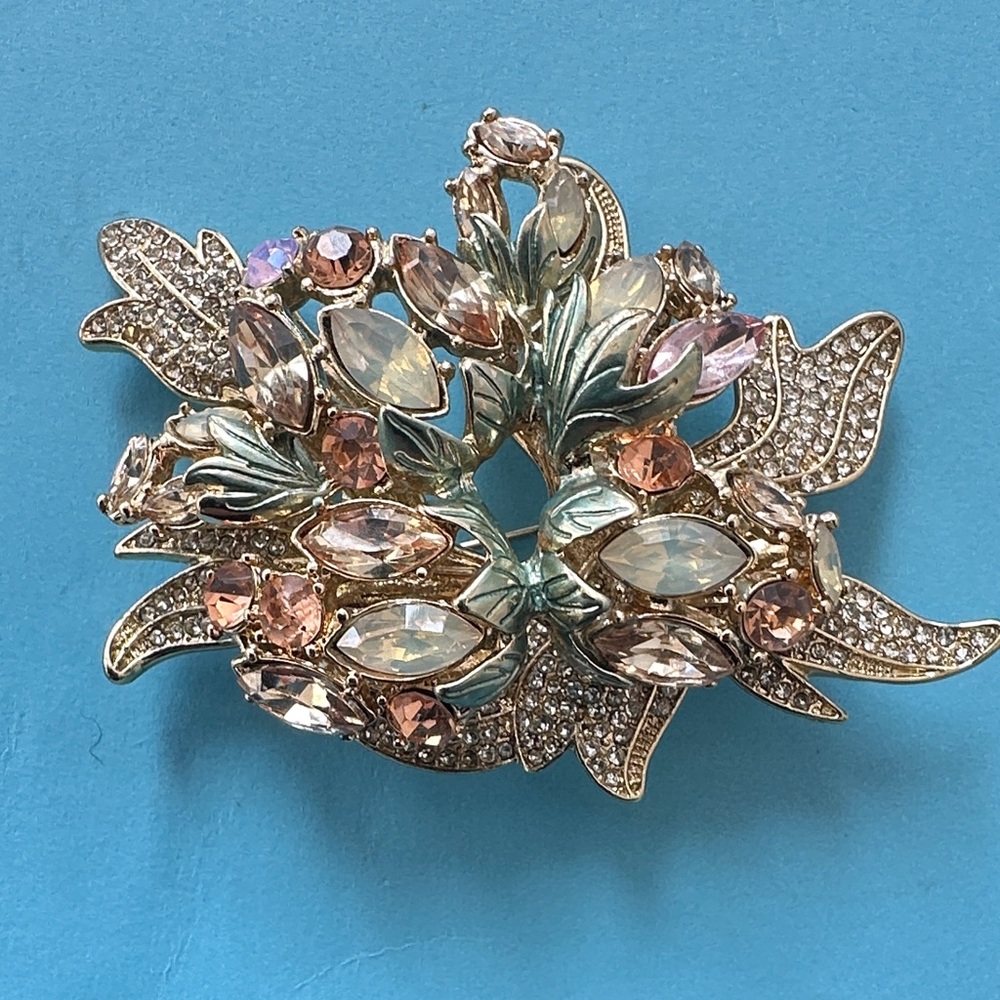 Elegant Floral Brooch with Crystal Accents by Ann Klein